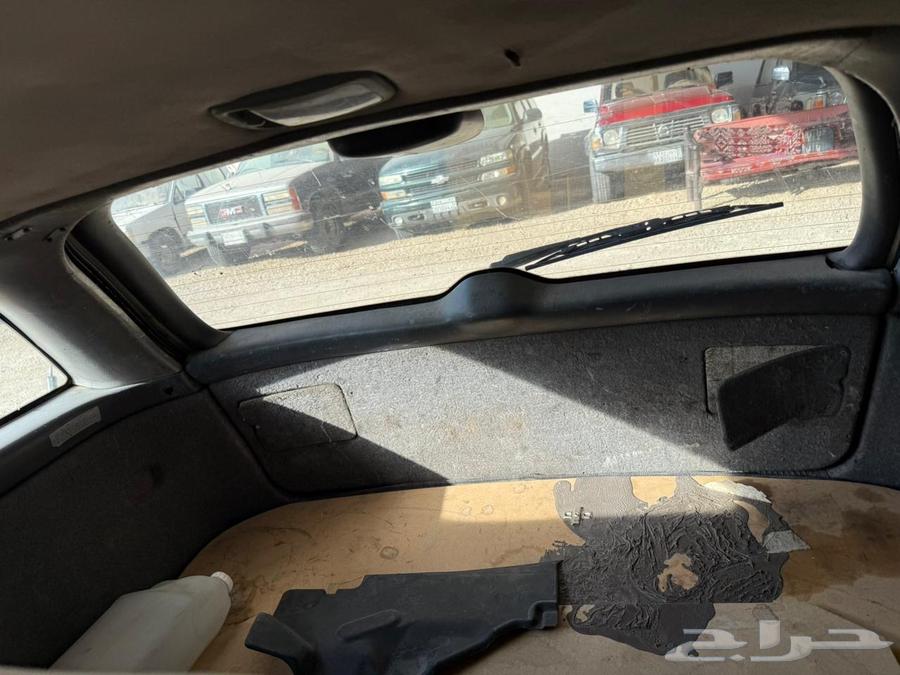 Camry with a dent in the trunk64439185714691114