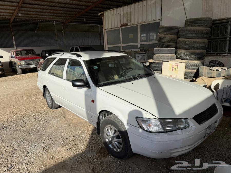 Camry with a dent in the trunk64439185714691110