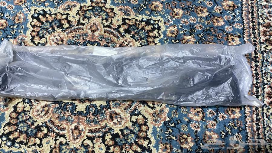 قاعدة لوحة مستبيشي L200 جديده اصليه64439974328835111