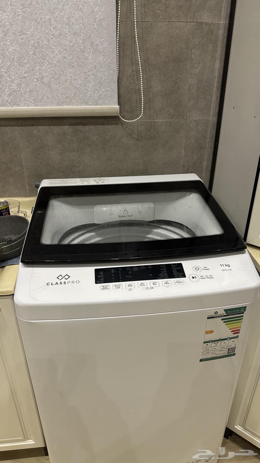 Automatic top-loading washing machine.64328976118913111