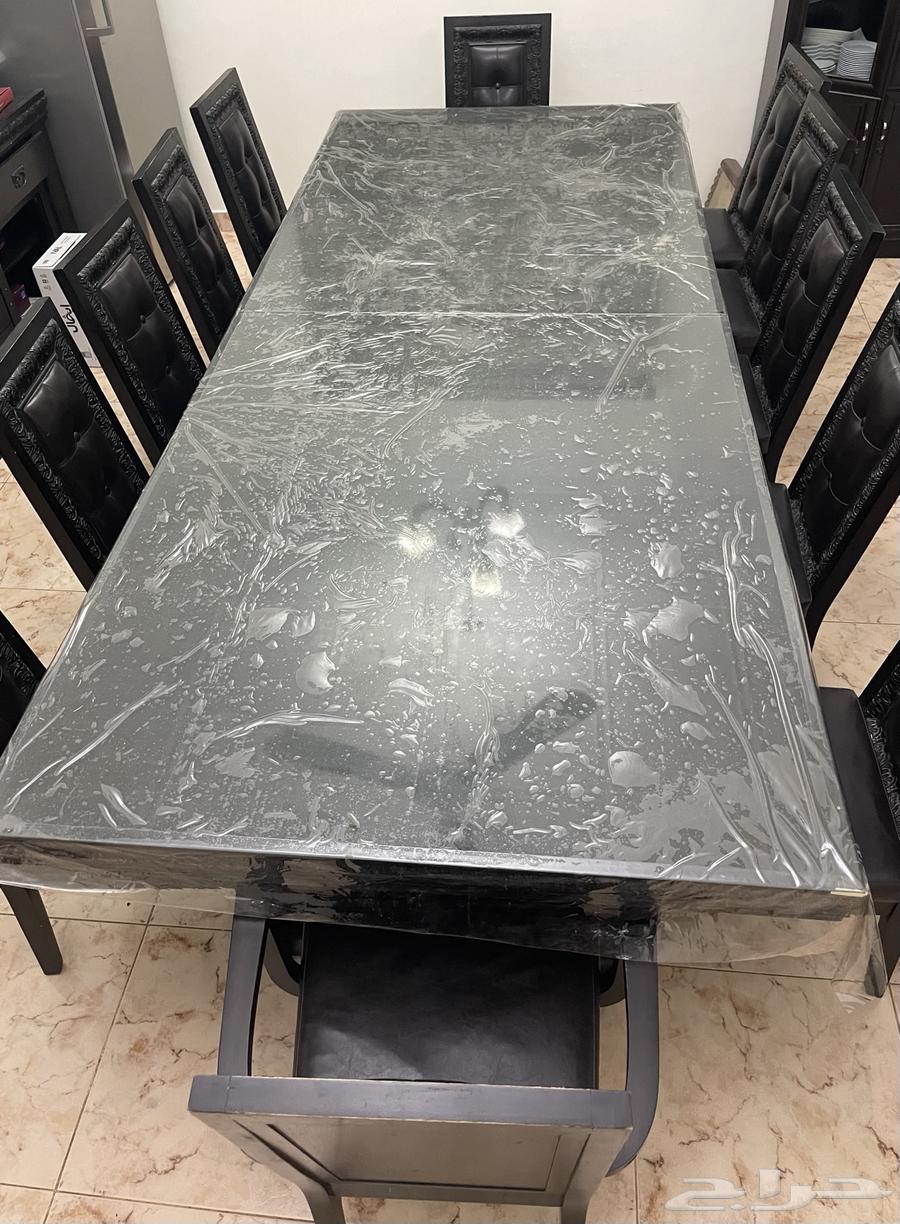 Large dining table with 12 chairs, free of any defects or damage64333995625729110
