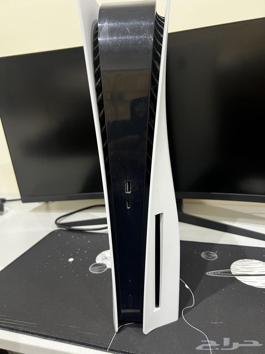 Sony Five with controller, charger, and two Grand Theft Auto discs64335740275202112