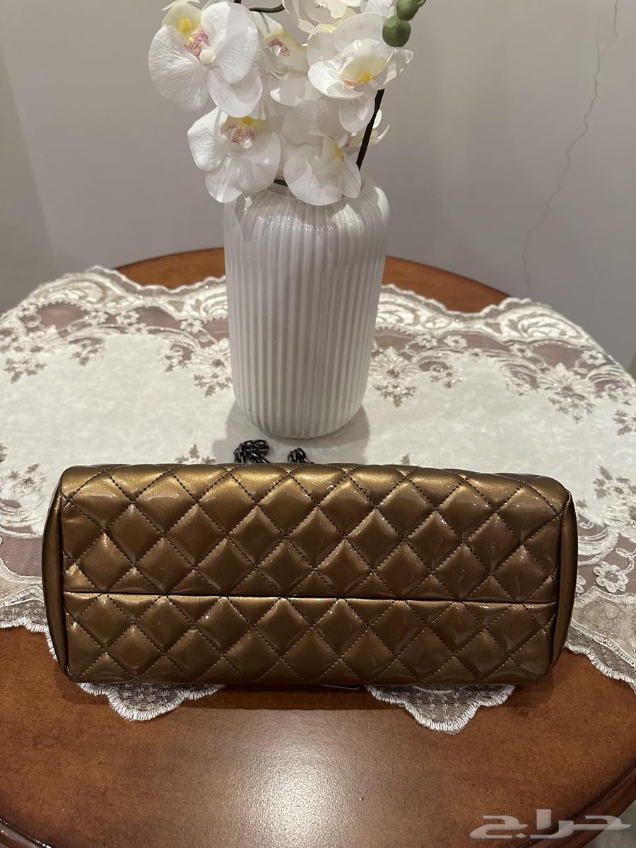 شنطة شانيل ذهبي64359030170627113