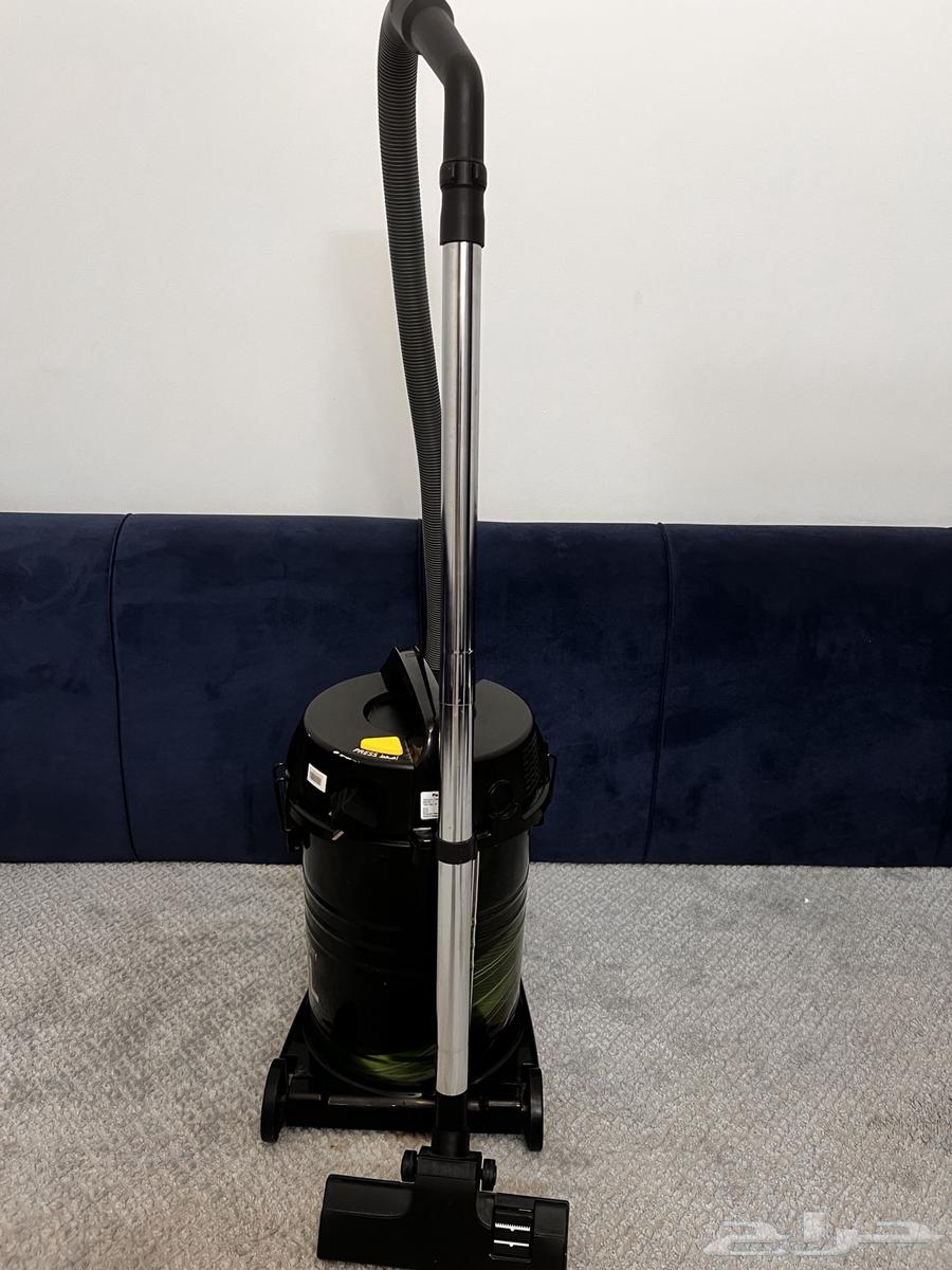 مكواة ملابس بخار ومكنسة كهرابائية للبيع64340598320769114