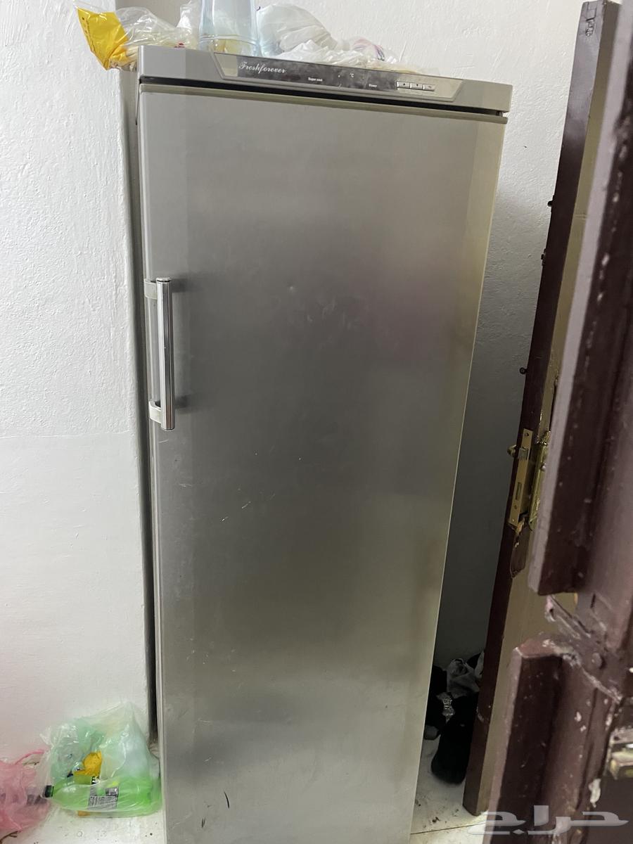 A large refrigerator with a control screen64346354485633114