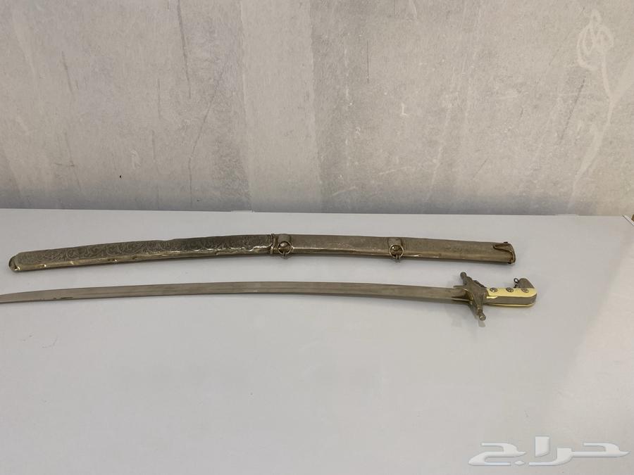 عرض على 4لوحات وقدر ضغط وسيف قديم64345552533635114