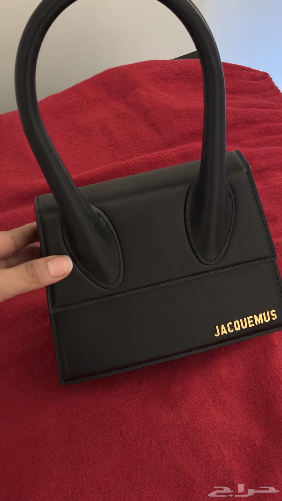 جاكموس وسط لون اسود   اصليه من ايطاليا .64355231471233111