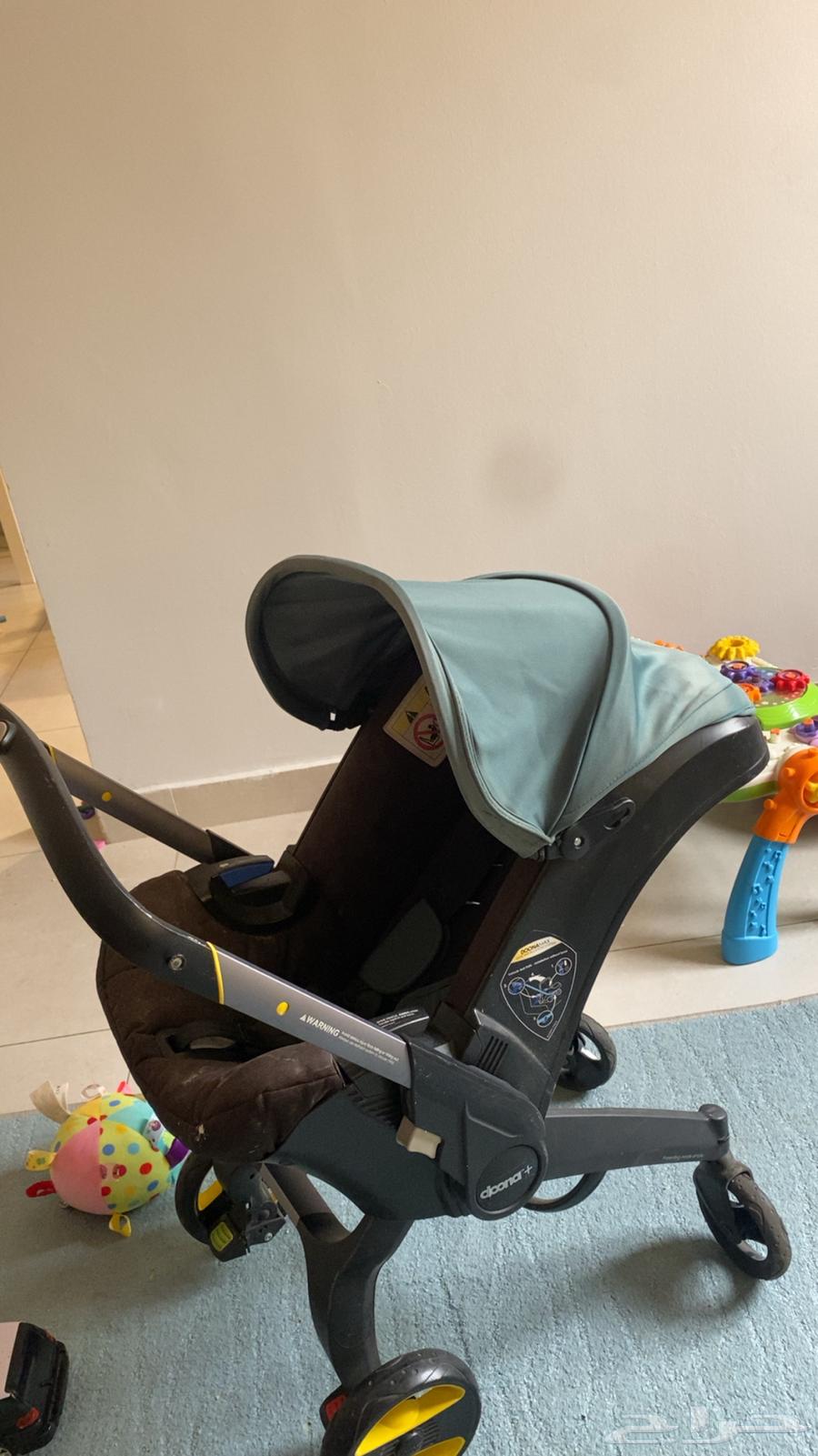 مقعد سيارة دوونا مع عربة64357674371969110