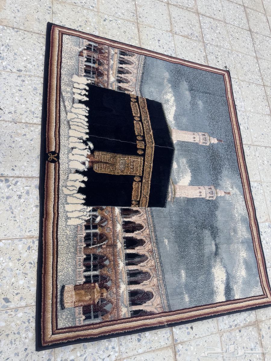 Some carpets are Turkish and a painting in the shape of a carpet64350988555521110