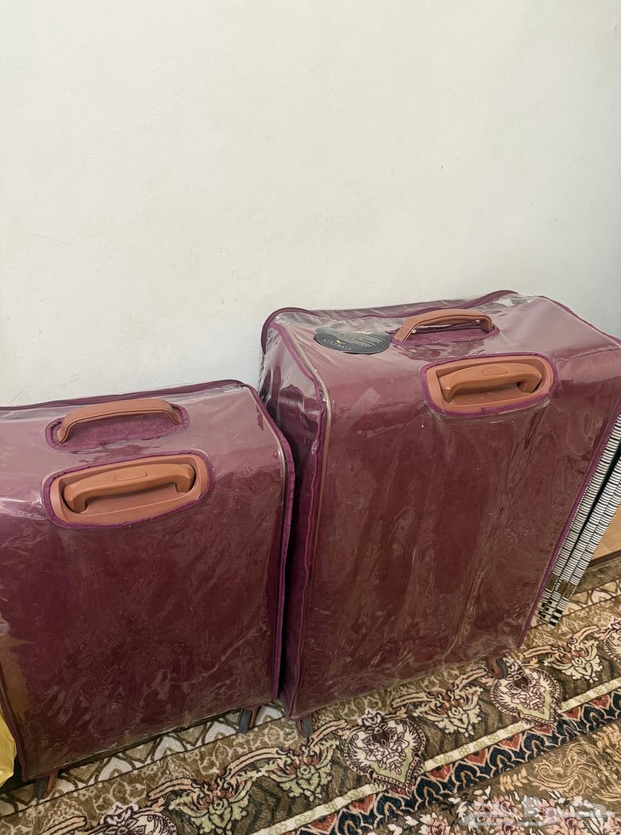 شنطة سفر 2 قطع عنابي64373311976323110