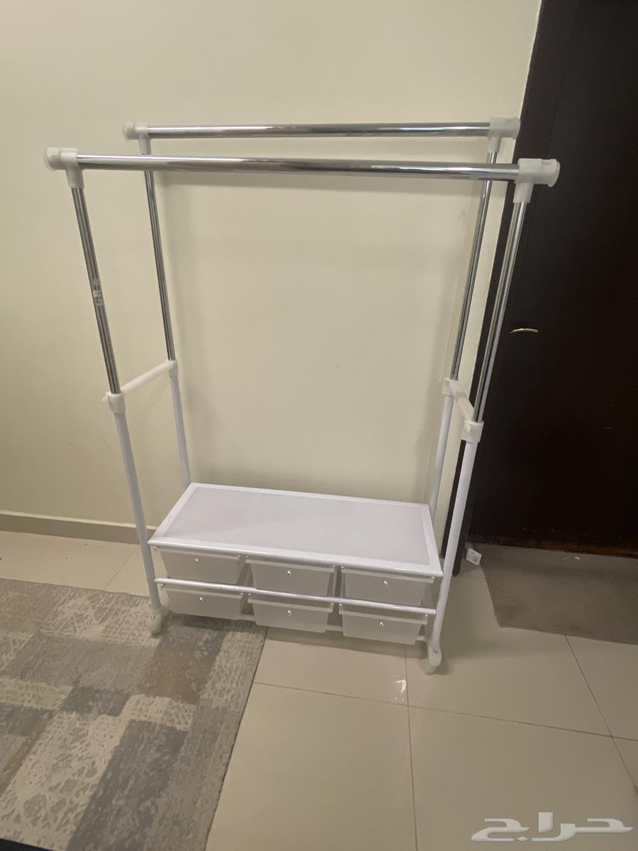 علاقة ملابس بأدراج64373861307266111