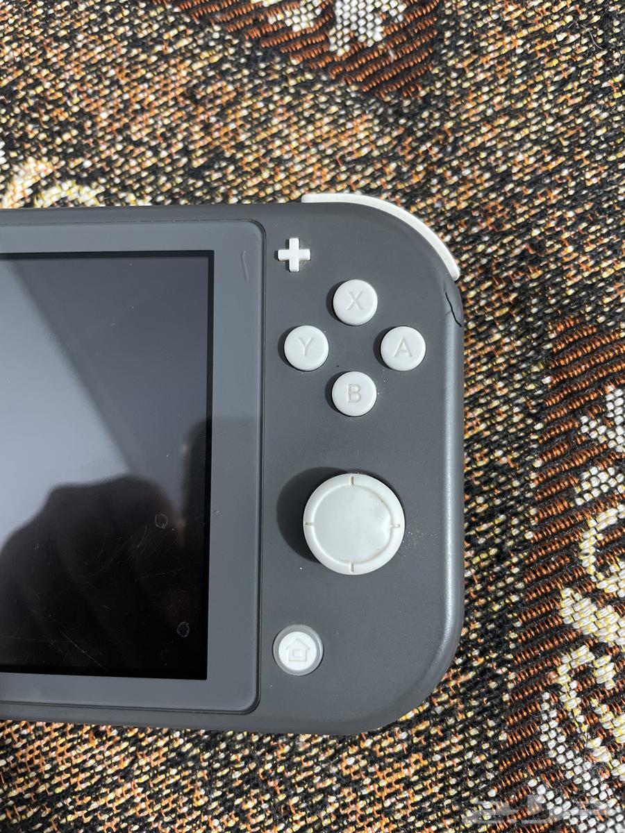 نينتندو سويتش لايت مع بطاقة ذاكرة 256 جيجابايت64377137859202111