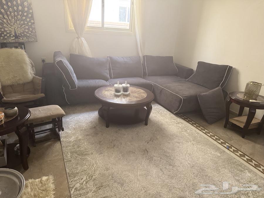 Sofa, rocking chair, and tables64368937093379112