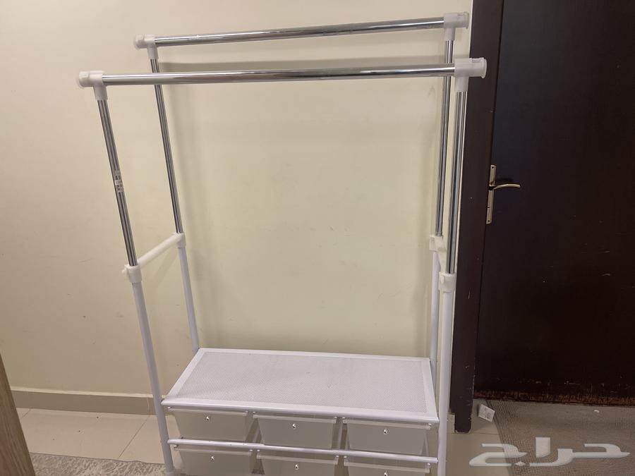 علاقة ملابس بأدراج64373861307266110