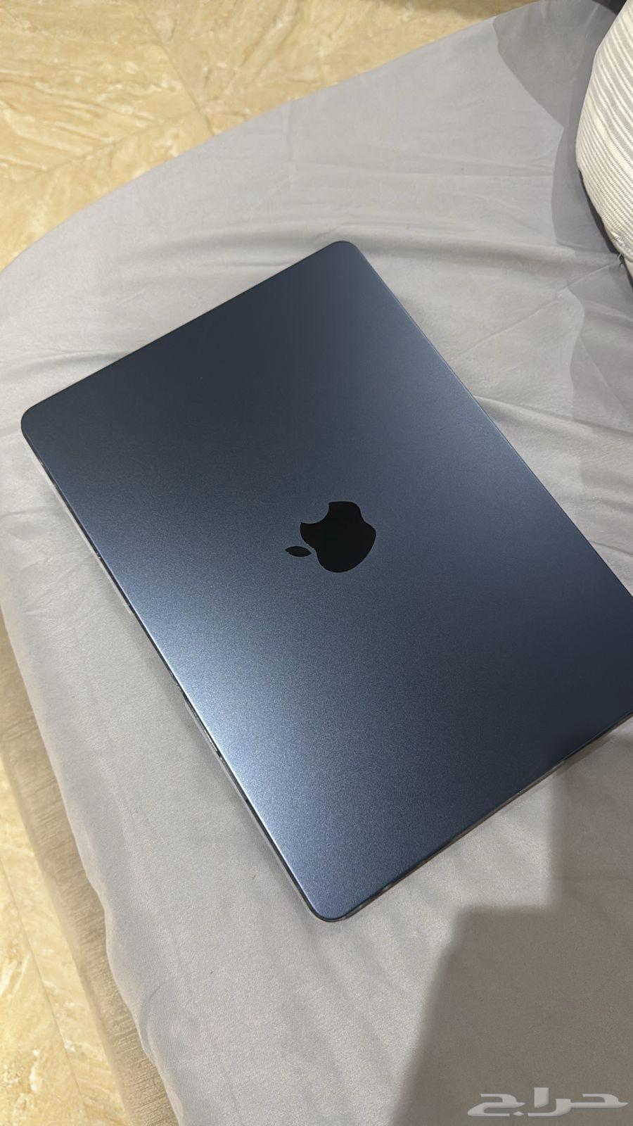 ماك بوك64376614814339111