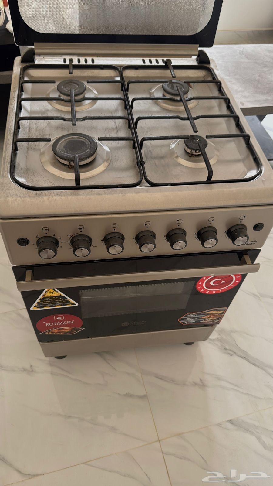 New Turkish oven and four-burner stove and TV tables and three service tables64376124706946113