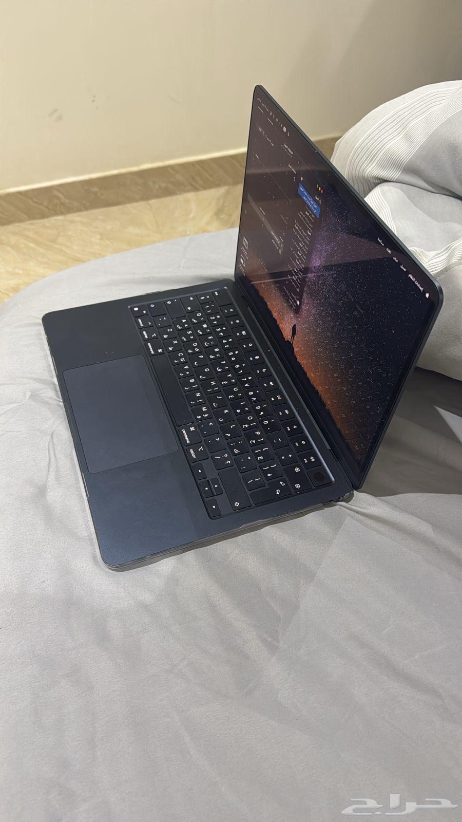 ماك بوك64376614814339110