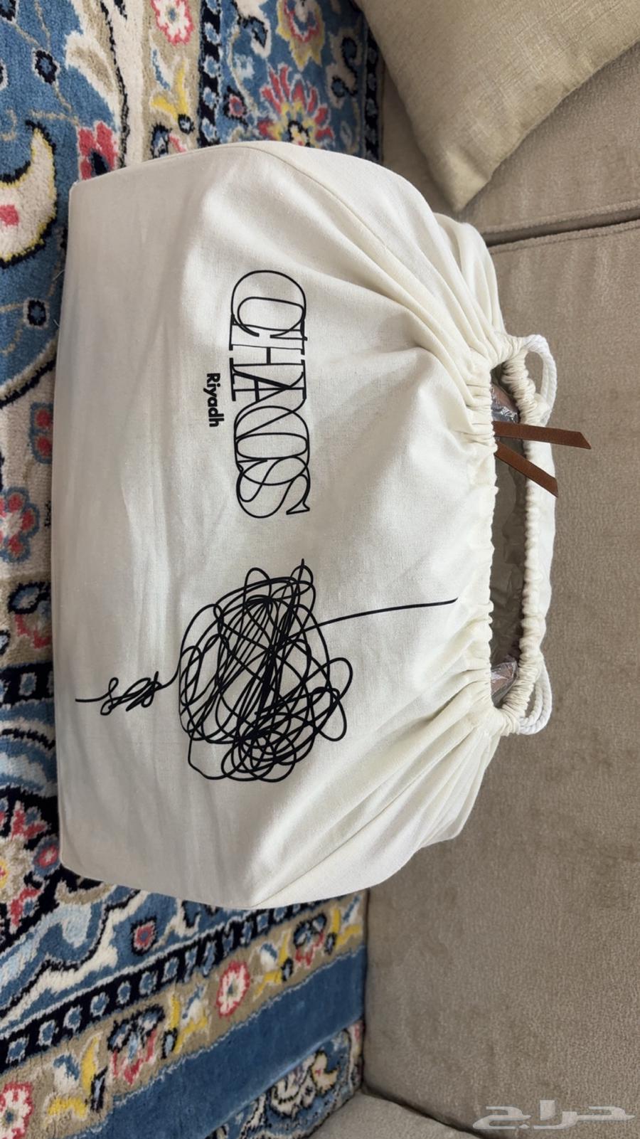 شنطة جلدية Chaos Riyadh مرسومة يدوي ا64383830235778114