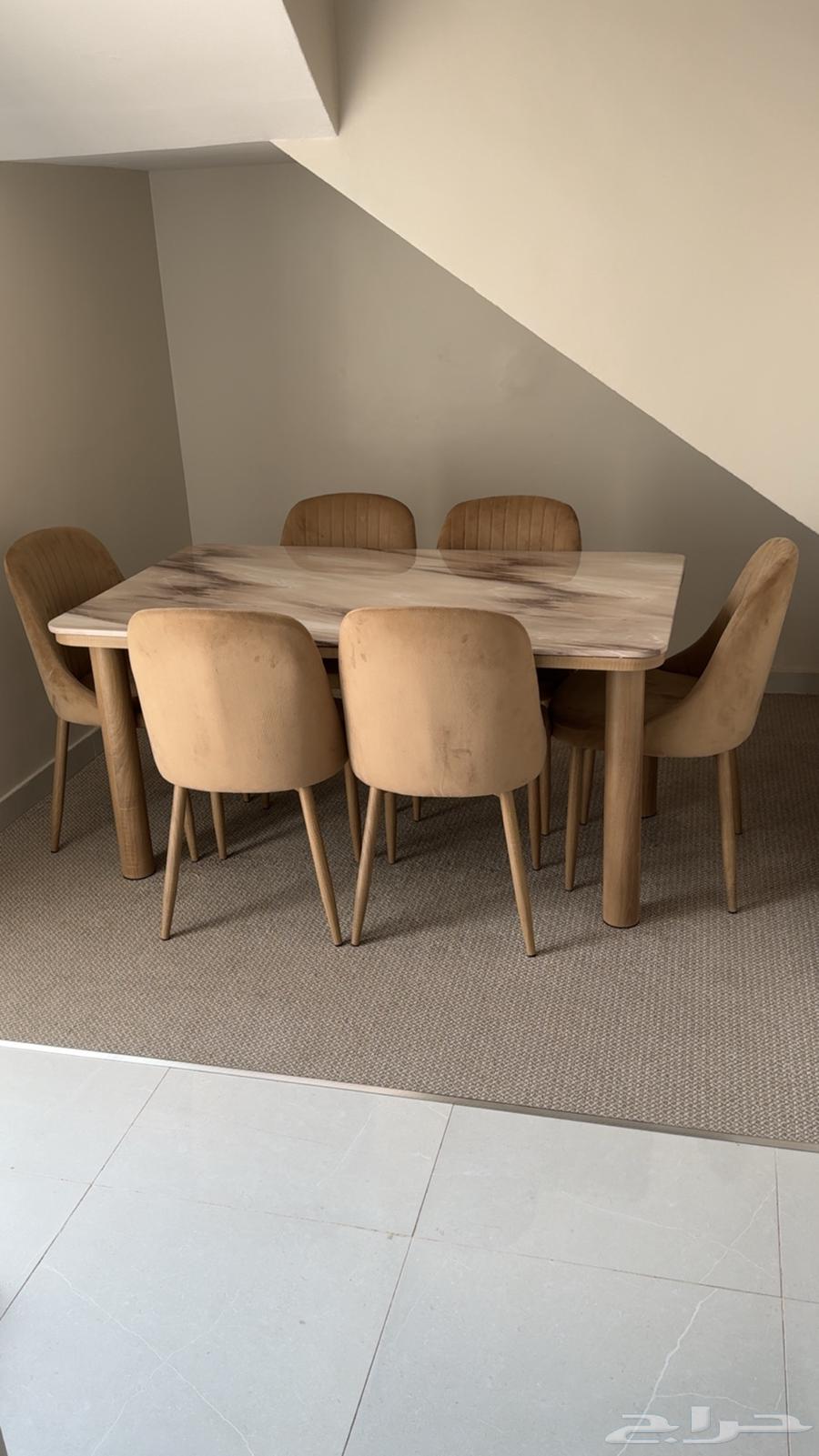 Marble table with 6 new chairs64384328309634111