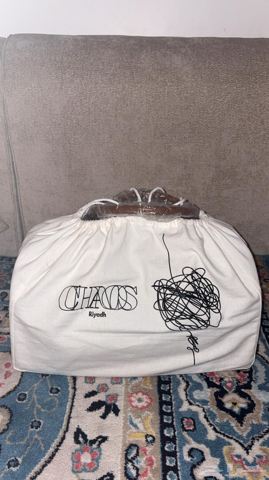 شنطة جلدية Chaos Riyadh مرسومة يدوي ا64383830235778111