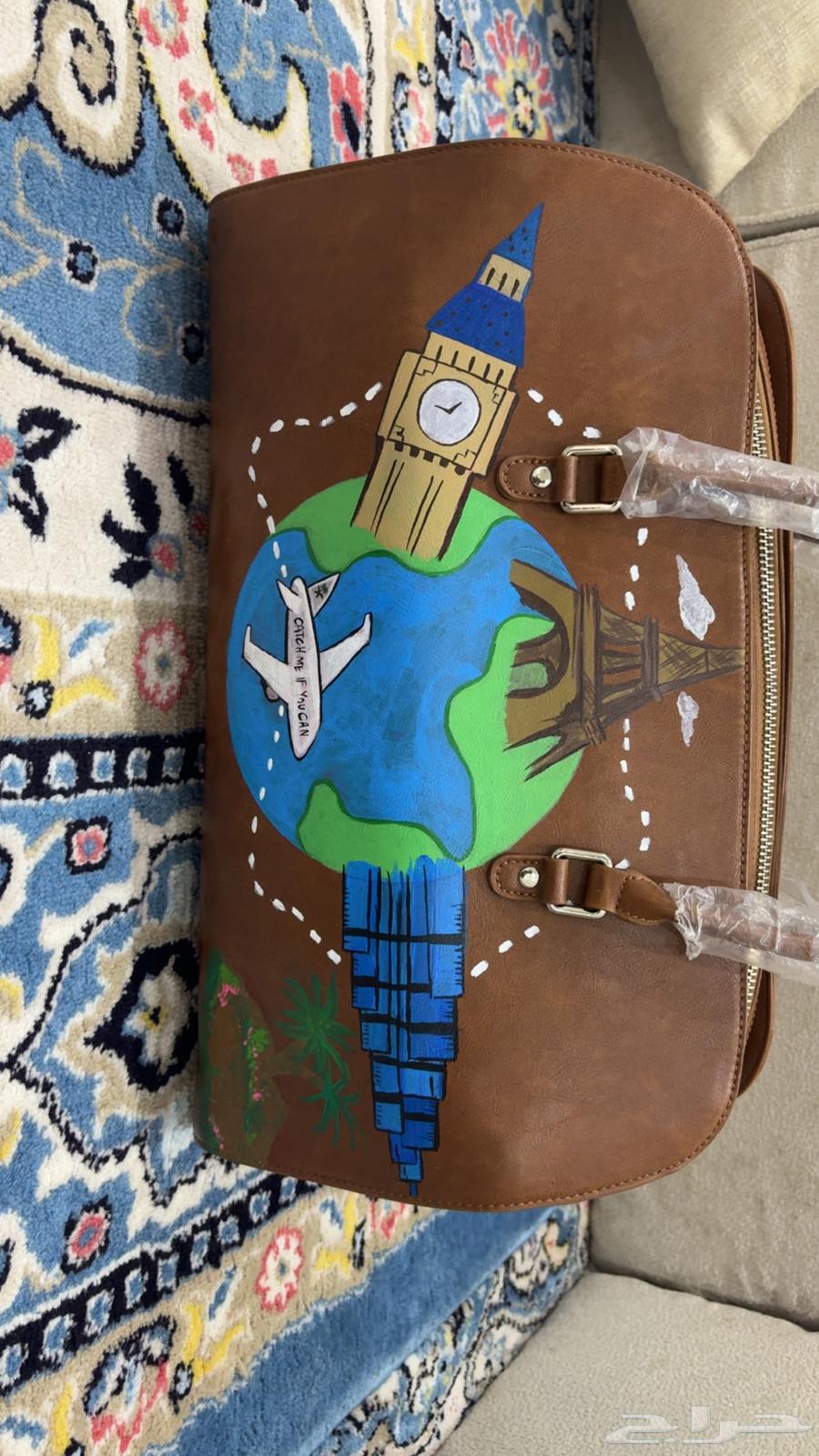 شنطة جلدية Chaos Riyadh مرسومة يدوي ا64383830235778110