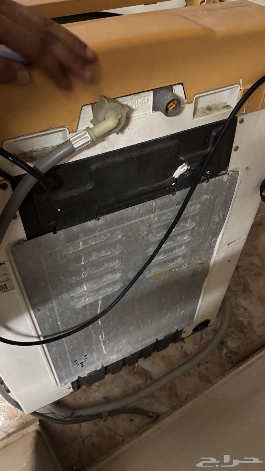 Broken automatic washing machine64380565980802110