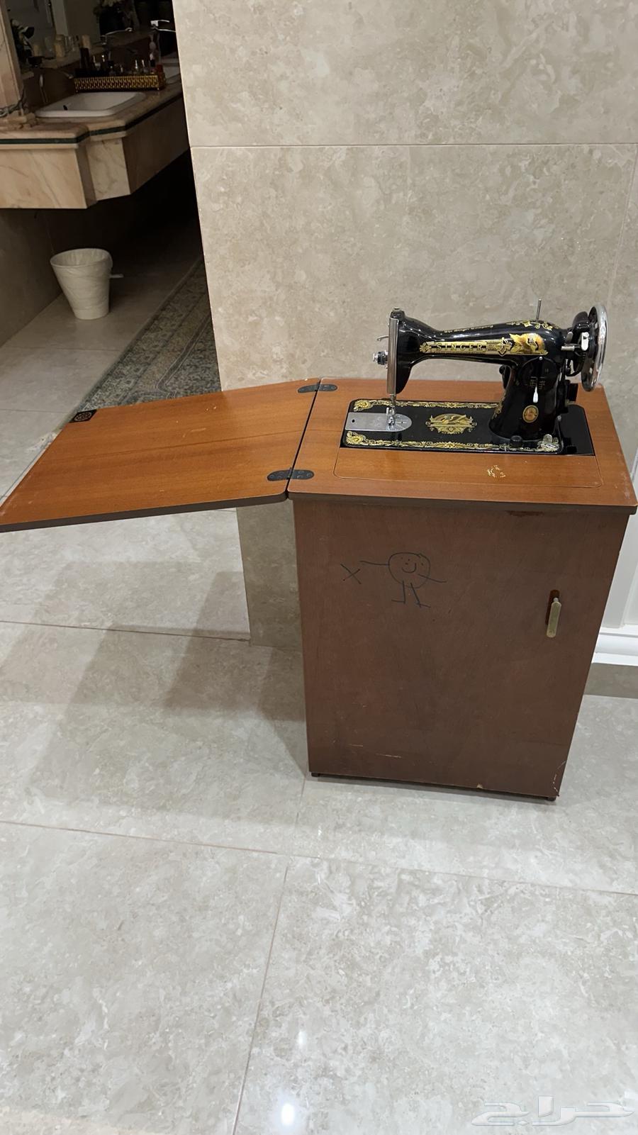 مكينة خياطه بطاولتها64377418465921112