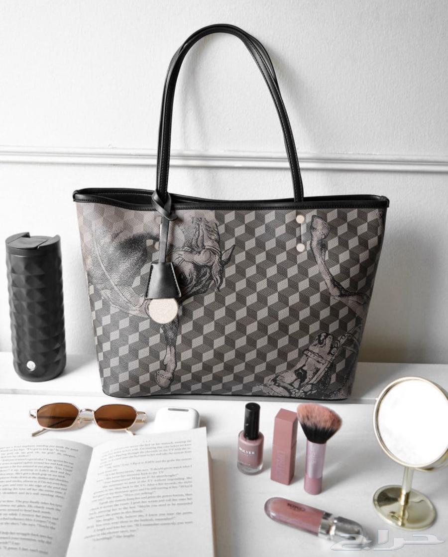 شنطة نسائية من الجلد بلون أسود64379370384771113