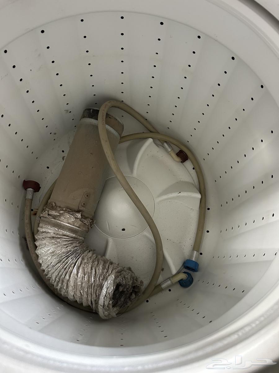 غسالة ونشافة وبانيو وزجاجه وسرير64386697094659114