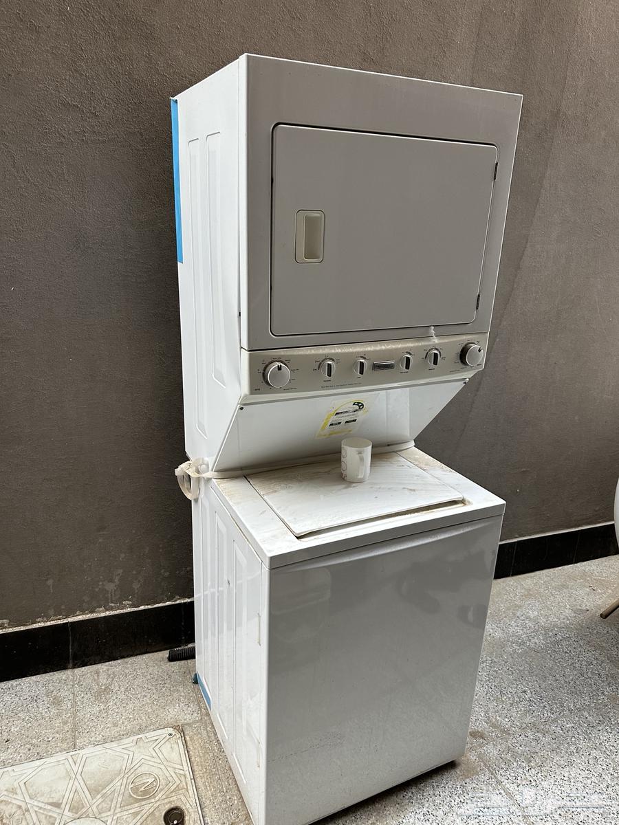 غسالة ونشافة وبانيو وزجاجه وسرير64386697094659110