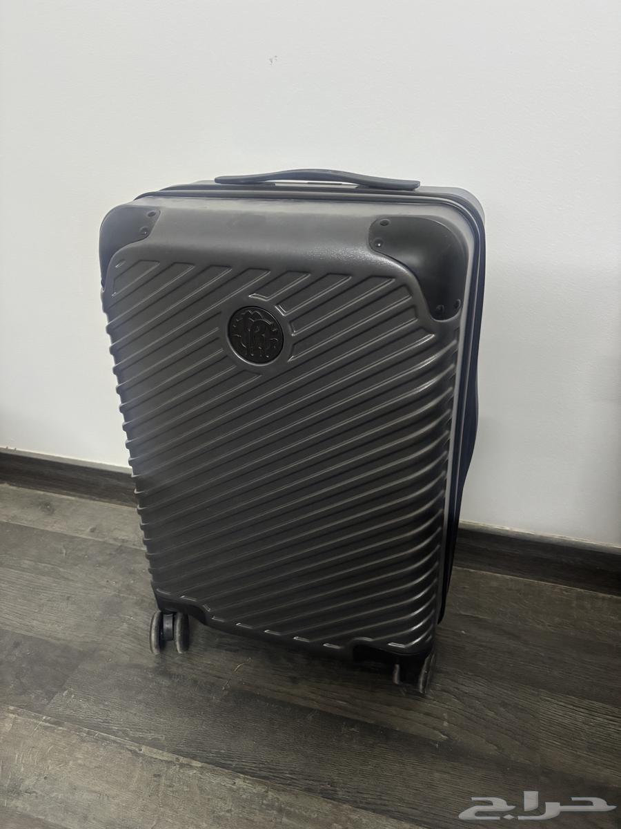 شنط سفر   ماركه روبرتو كافالي64377827257090110