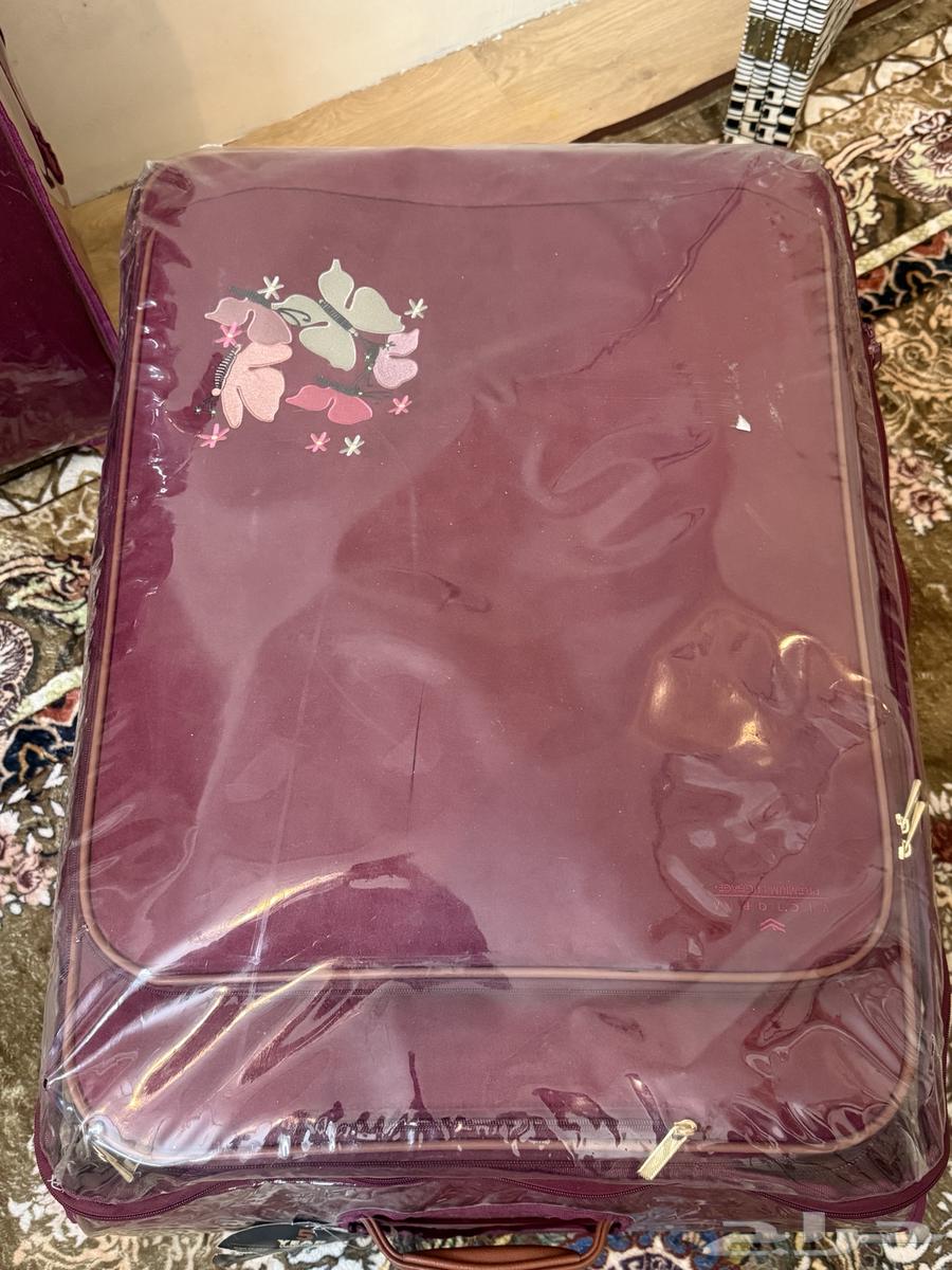 شنطة سفر 2 قطع عنابي64373311976323113