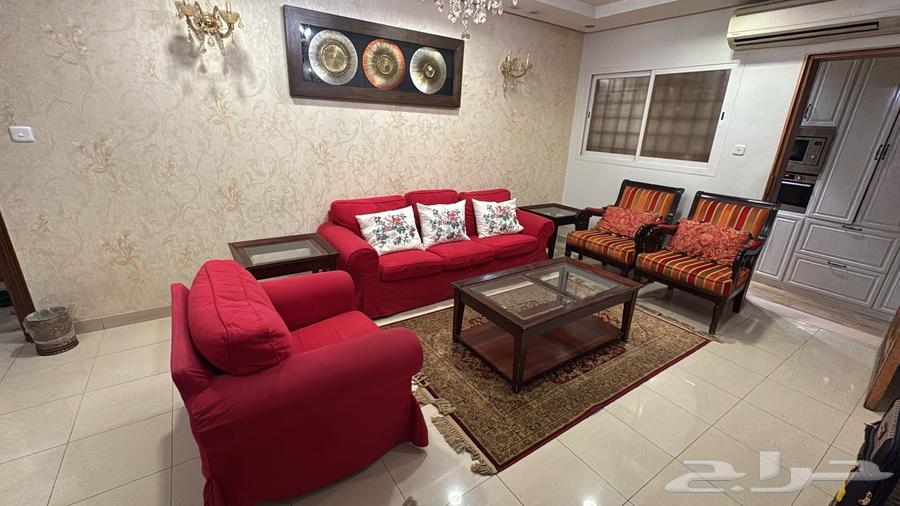 Used red IKEA sofa set with two chairs and a 3-piece table set64390333609601113