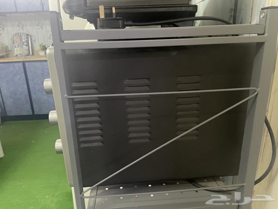 ثلاجه كبيره وفرن كهربائي صغير64388148841475114