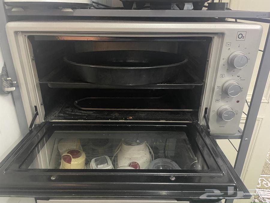 ثلاجه كبيره وفرن كهربائي صغير64388148841475113