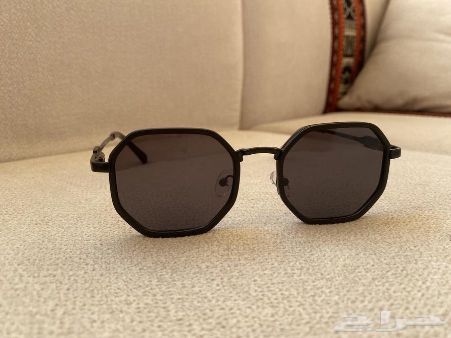 نظاره شمسيه رجالي معها أغراضها64385439791235110