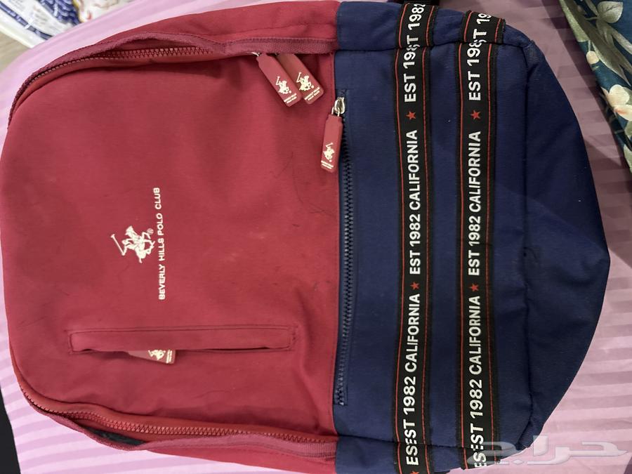 شنطه بولو اصليه 10064387843642113110