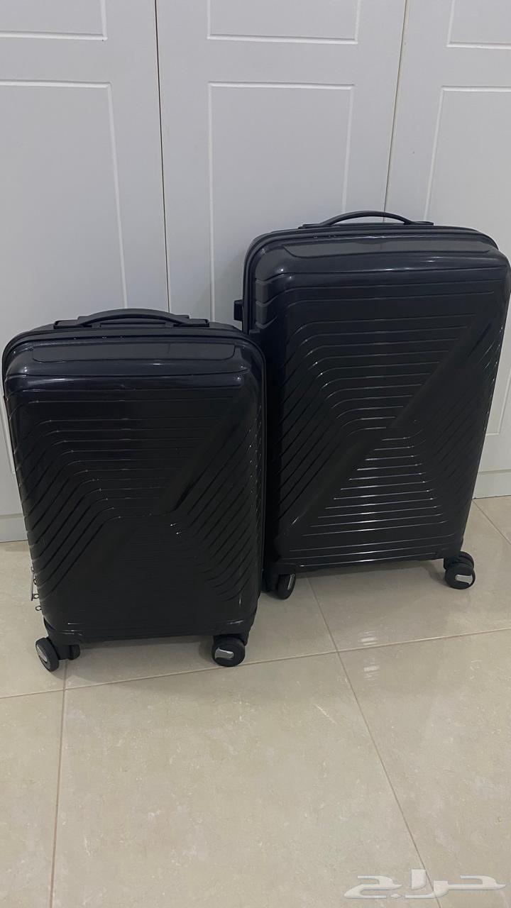 شنط سفر سودا جديدة64383691185793110