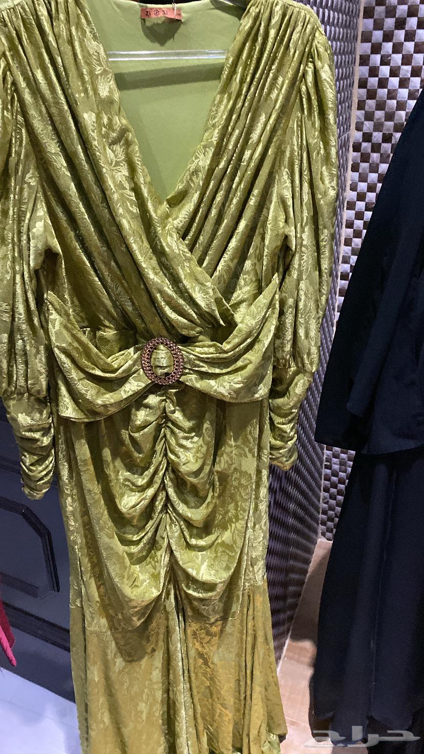 Two dresses, the first yellow one size XL with length 165 and the second M.16564378992636930111