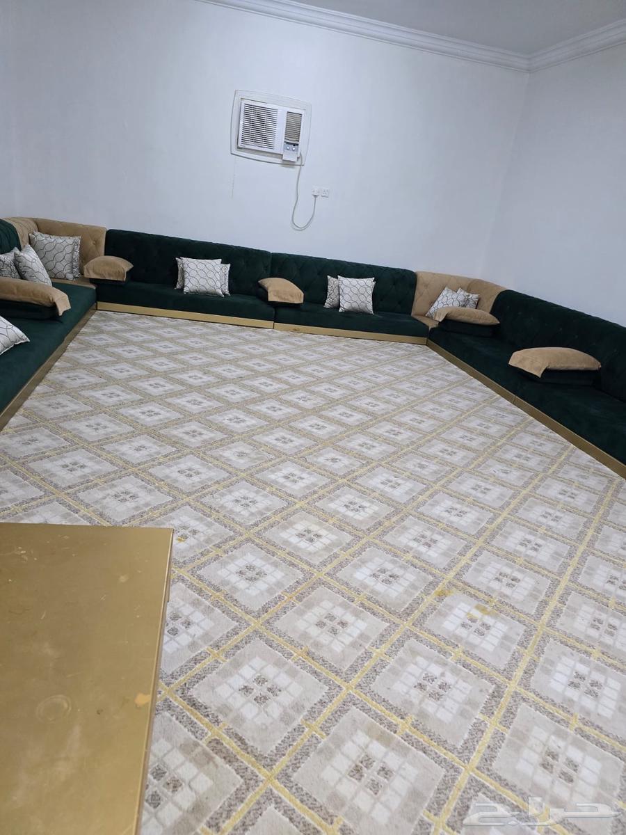 Green and beige used floor seating set, 4 by 6 meters, with curtain and 7 golden tables that have some scratches, two of them need stitching and adjustments64400702505603110