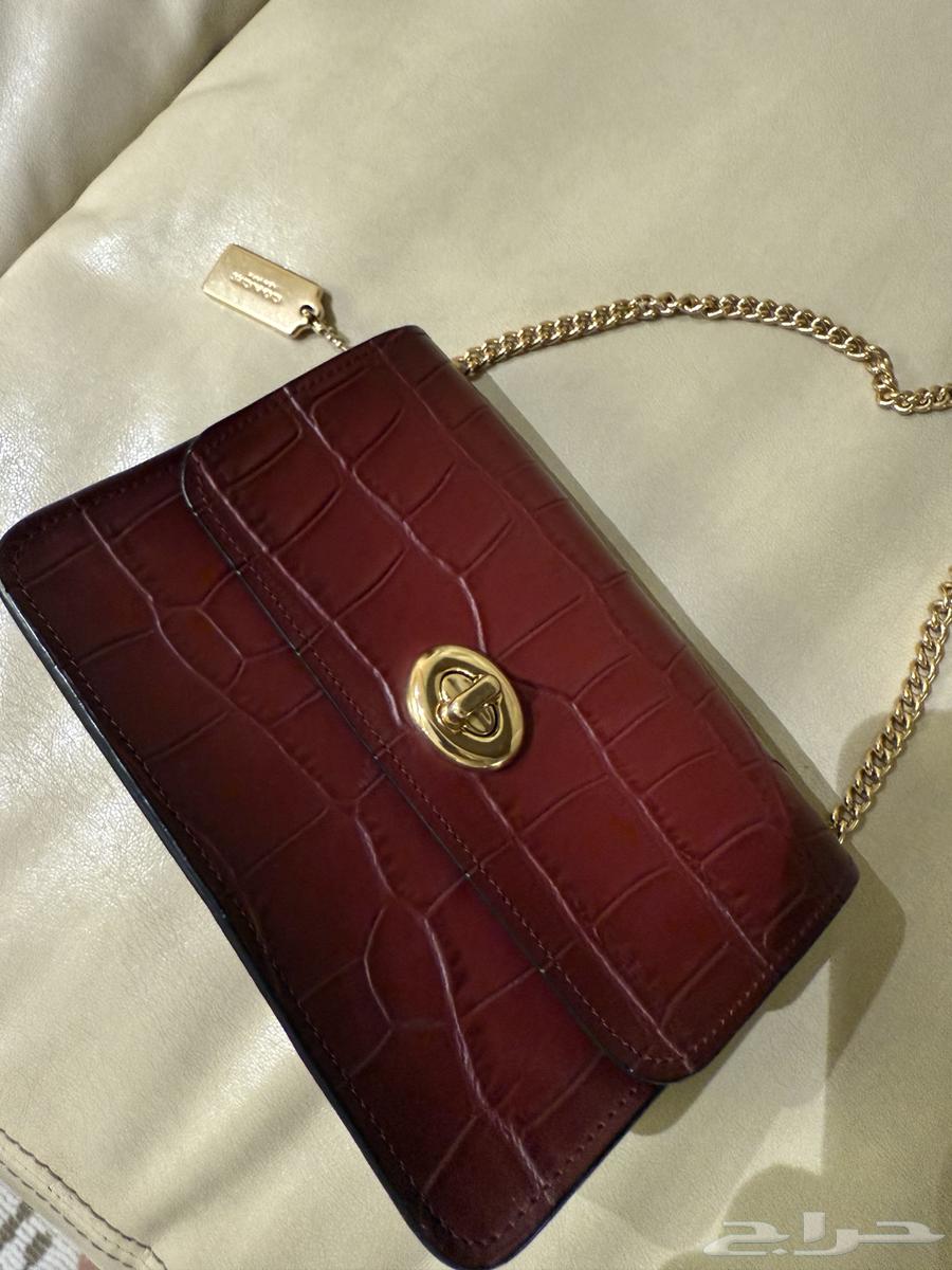 شنطه كوتش ميني سلسال طويل شبه جديده   بدون اي ملحقات64400425528450111