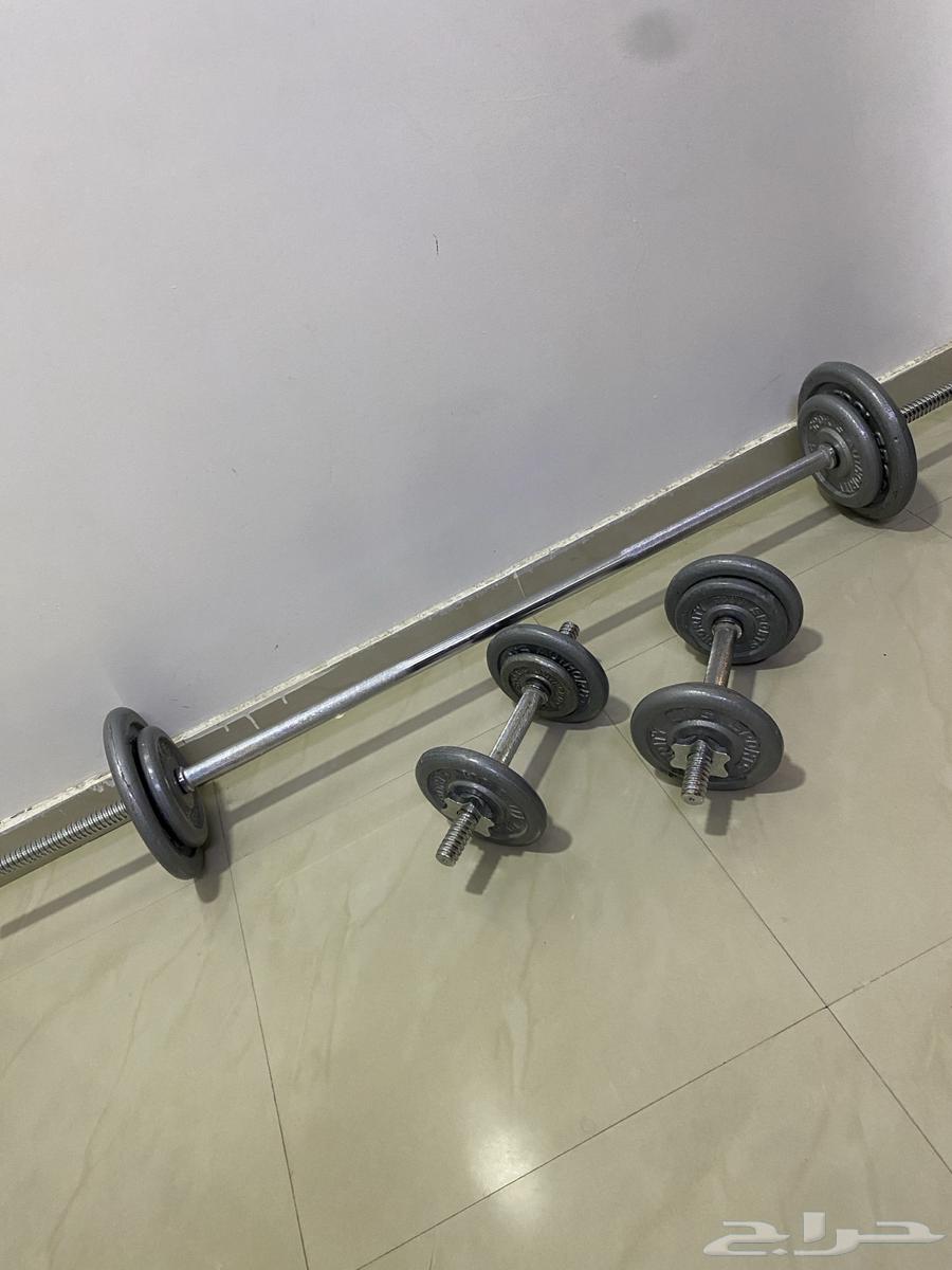 Clean weight bench with weights and personal use only64399814979330112
