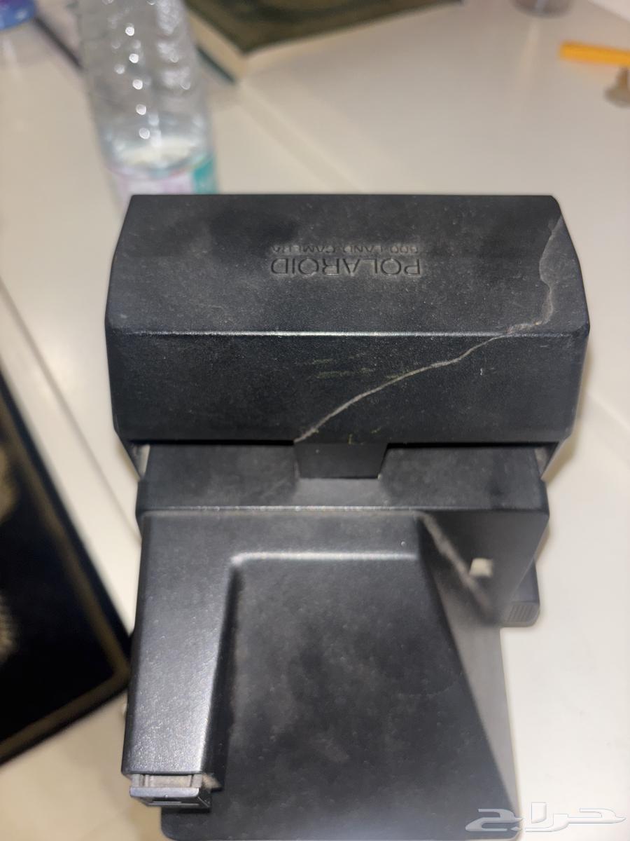 An old frame over 70 years old, Polaroid 630 camera64396505539585112