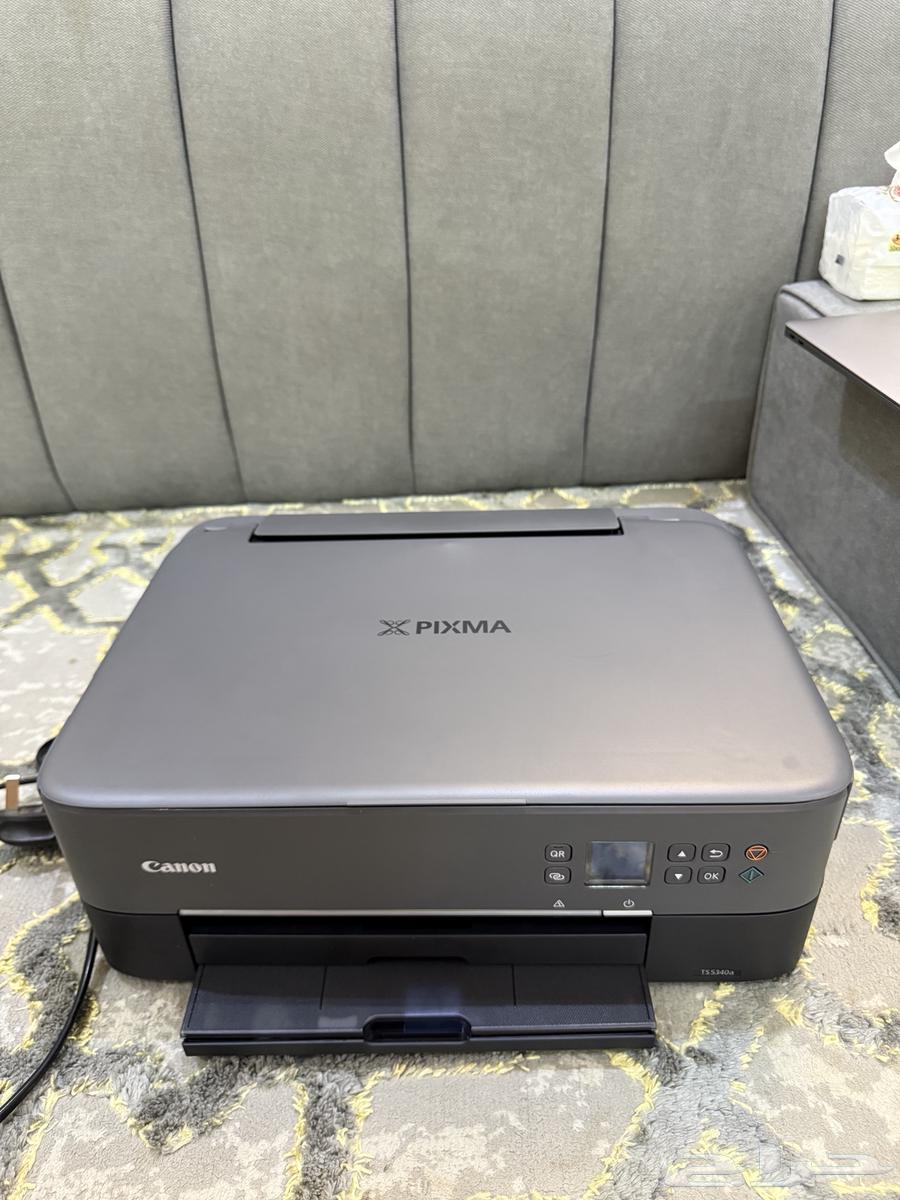 لابت توب أبل(ماكب بوك 2020)ومعه طابعه من كانون pixma64399272048899114