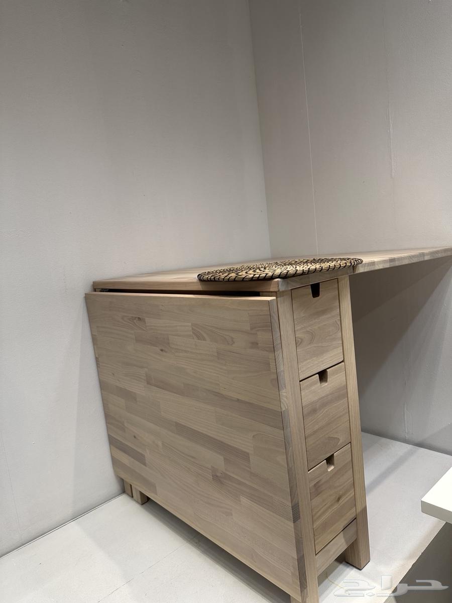 Table64393942874882112