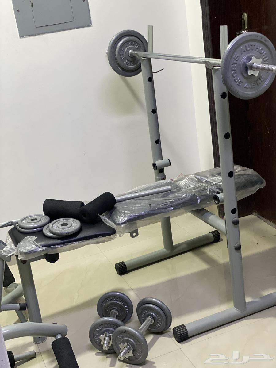 Clean weight bench with weights and personal use only64399814979330110