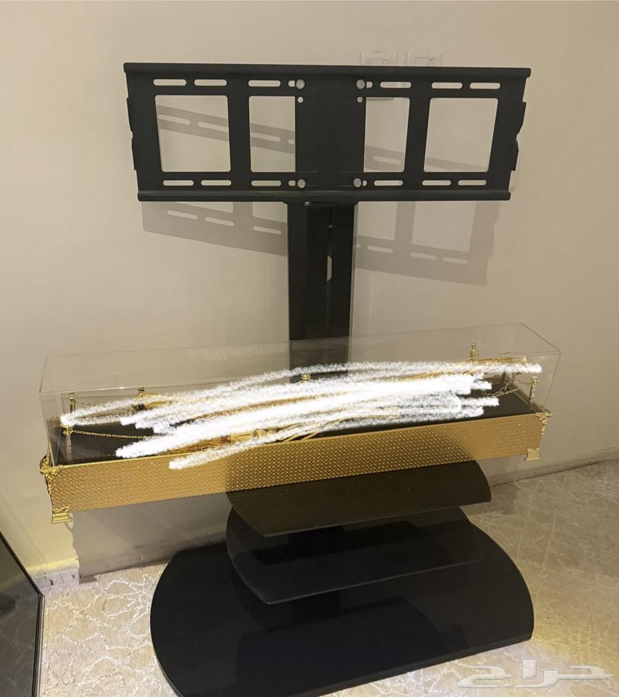 تلفزيون وطاولته للبيع 50 بوصة64397074954369110