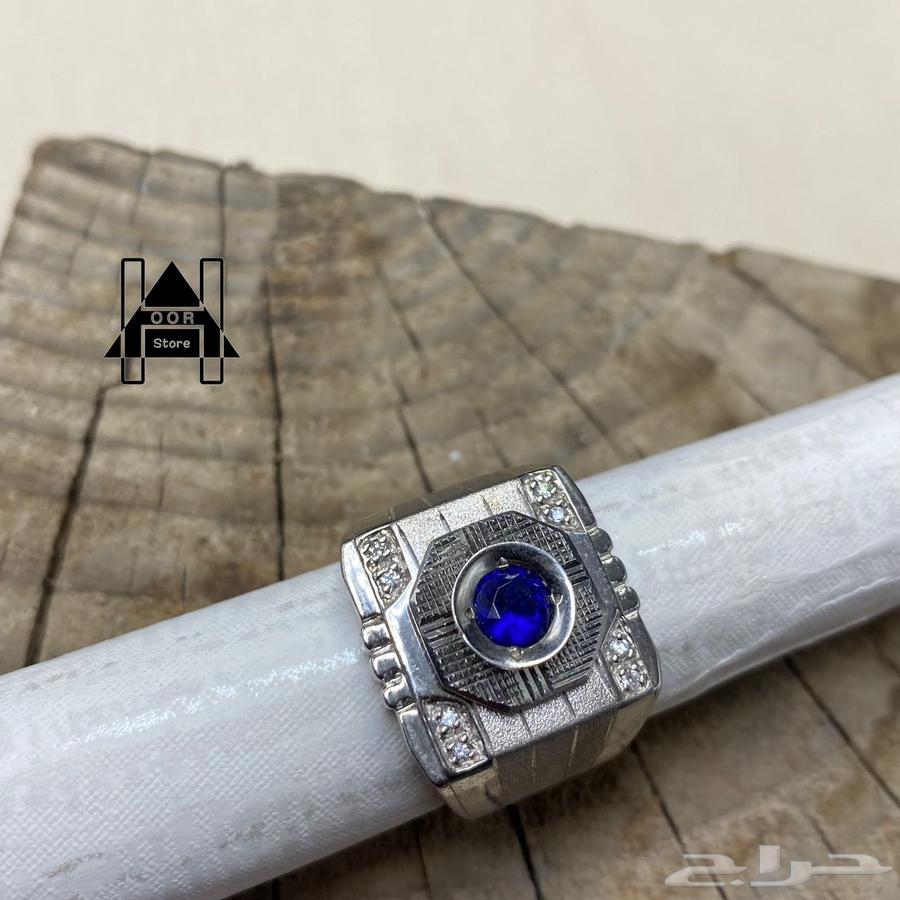 خاتم فضه إيطالي راقي وفخم بفص ياقوت ازرق ومرصع بزركون64394813754753114