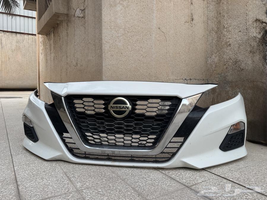 صدام و شبك و علامة نيسان التيما  2019 2022  تجاري لون لؤلؤي64539882303105110