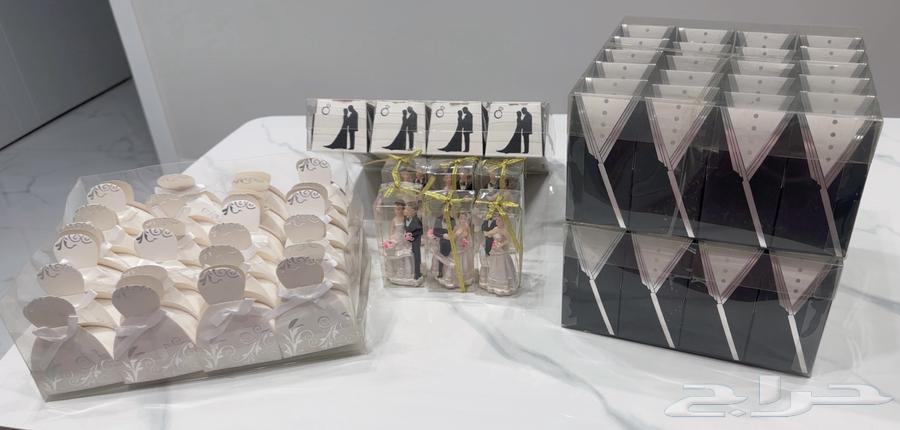 توزيعات زواج توزيعات ملكة توزيعات عرسان بأسعار جمله64396922169857110